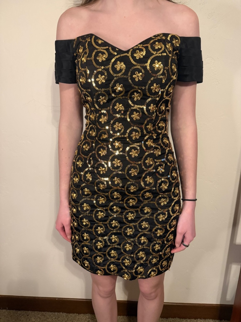 Off-Shoulder Black Dress with Gold Sequin Motif